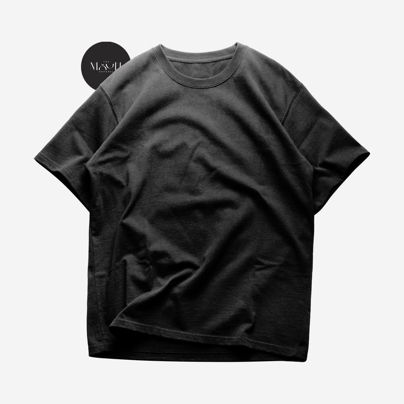 May include: A black short-sleeved t-shirt with a crew neck.