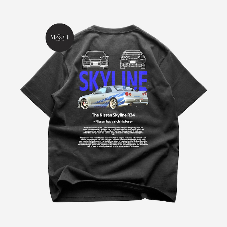 May include: Black t-shirt with a blue and white graphic of a Nissan Skyline R34 car. The text "SKYLINE" is printed in blue above the car and "The Nissan Skyline R34 - Nissan has a rich history." is printed below the car.