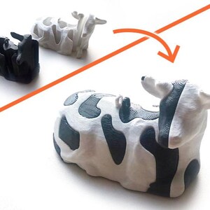 May include: A white and black cow-shaped decorative object. The cow has black spots and a black face. The image shows the cow in three different colors: black, white, and the final product with black spots.