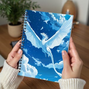 May include: A white dragon with blue eyes soars through a blue sky with white clouds. The dragon's wings are spread wide and its tail is trailing behind it. The dragon is flying towards the top of the image.