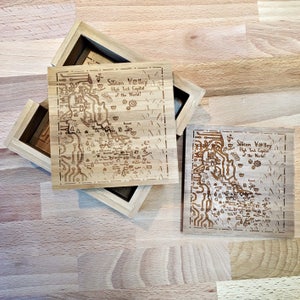 May include: Two wooden coasters with a laser-engraved map of Silicon Valley. The coasters feature the text "Silicon Valley High Tech Capital of the World!"