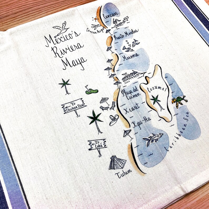 May include: A hand-drawn map of Mexico's Riviera Maya, featuring locations such as Cancun, Playa del Carmen, Tulum, and Cozumel. The map is drawn in black ink on a white background with blue and yellow watercolour accents.