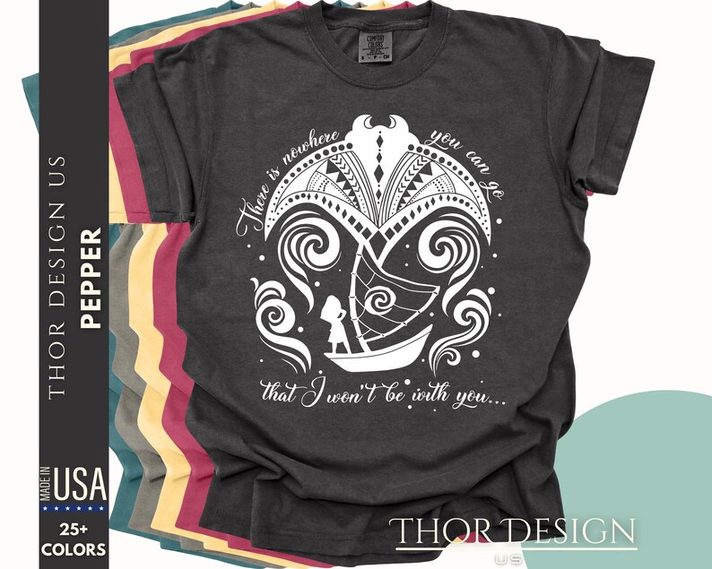 May include: A dark gray t-shirt with a white graphic design of a boat sailing through waves. The text "There is nowhere you can go that I won't be with you..." is printed on the shirt.