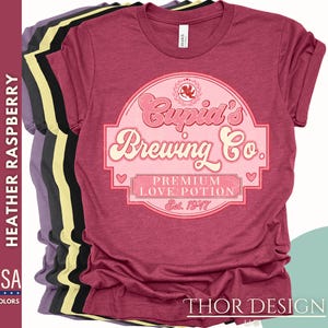 Valentine&#39;s Day Shirt | Cupid&#39;s Brewing Co Love Potions Est 1947 | Cute Valentine&#39;s Gift | Premium Cupid Tee | Romantic Valentine&#39;s Shirt