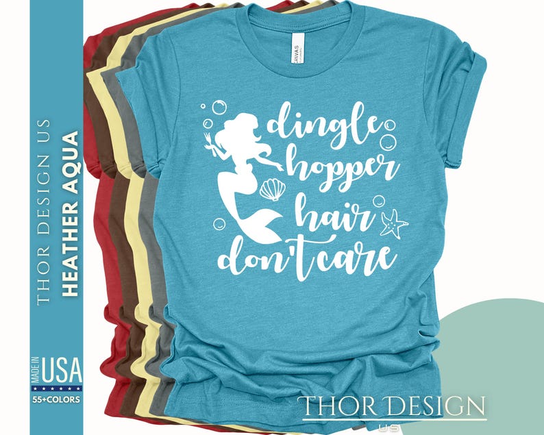 May include: A turquoise blue t-shirt with a white silhouette of a mermaid with the text "dingle hopper hair don't care".