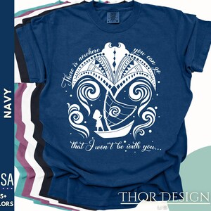 May include: Navy blue t-shirt with a white graphic design of a sailboat and a girl with the text "There is nowhere you can go that I won't be with you..."