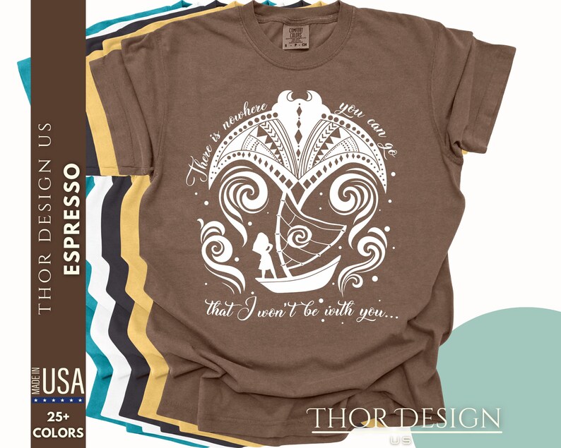 May include: A brown t-shirt with a white design of a boat sailing through waves. The design includes the text "There is nowhere you can go that I won't be with you..."