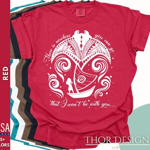 May include: Red t-shirt with a white graphic design of a boat sailing through waves. The text "There is nowhere you can go that I won't be with you..." is printed on the shirt.