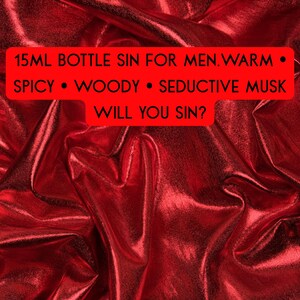 May include: A red background with a shiny, textured appearance. A red rectangle contains the text: "15ML BOTTLE SIN FOR MEN. WARM &bull; SPICY &bull; WOODY &bull; SEDUCTIVE MUSK WILL YOU SIN?"