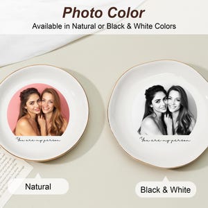 May include: Two decorative ceramic dishes with gold rims. One dish features a color photo of two women, the other a black and white photo. Text on the dishes reads "You are my person."
