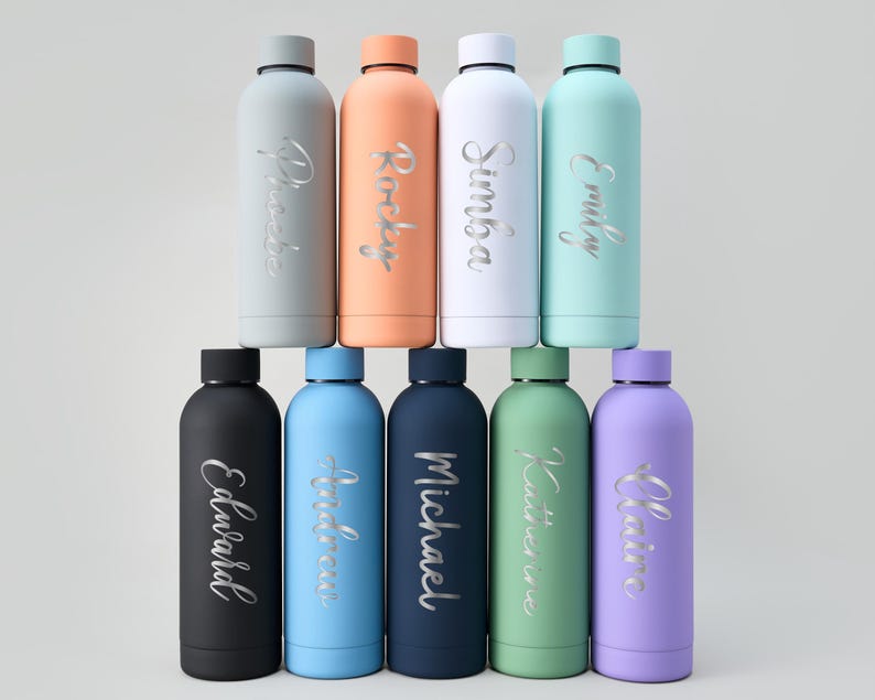 May include: A collection of ten insulated water bottles in various colors, including gray, orange, white, and blue. Each bottle has a silver name inscription. The bottles are arranged in two rows, with five bottles in each row.
