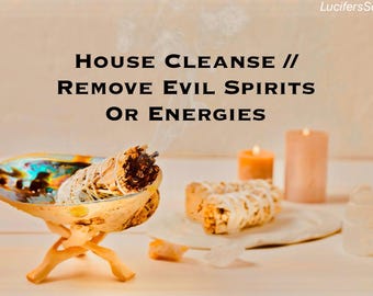 May include: A white sage smudge stick burning in a seashell holder, with smoke rising above it. Two candles and a crystal are also in the image. The text "HOUSE CLEANSE // REMOVE EVIL SPIRITS OR ENERGIES" is written above the image.