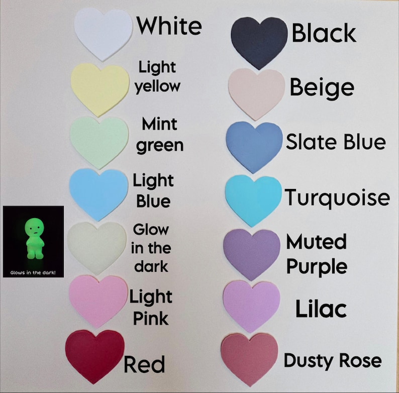 May include: A color chart featuring heart-shaped samples in various shades, including white, black, light yellow, beige, mint green, slate blue, light blue, turquoise, glow-in-the-dark, muted purple, light pink, lilac, red, and dusty rose. A small, glowing green figure is also shown.