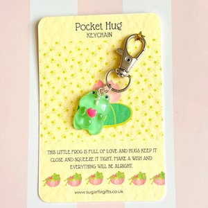 Dije/llavero para bolso con forma de rana, incluye bolsa de regalo de organza.