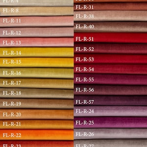 May include: A color swatch chart for FL-Royal Velvet fabric featuring two columns of stacked velvet textile samples in various shades including white, beige, pink, yellow, orange, red, purple, and grey, each labeled with a unique code.