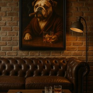 May include: A framed painting of a bulldog in a robe, smoking a cigar and holding a glass of whiskey. The painting hangs above a brown leather sofa. A wooden coffee table holds glasses and snacks.