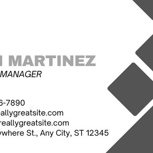 Contact-side business card design with a sample logo, Dani Martinez name, Finance Manager title and contact details beside dark geometric shapes.