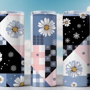 May include: A set of three ceramic mugs with a speckled, matte finish. The mugs are in shades of cream, light gray, and dark gray. Each mug has a simple, minimalist design, perfect for coffee or tea.