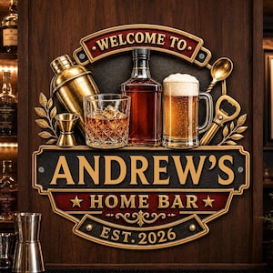 May include: A decorative wooden wall sign featuring the text "WELCOME TO" above a gold cocktail shaker, a glass of whiskey, a beer mug, a spoon, and a bottle opener. Below, a plaque reads "ANDREW'S HOME BAR" and "EST. 2026" in gold lettering.