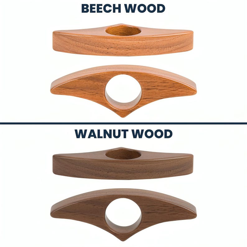 May include: Wooden book page holders in beech and walnut wood. The beech wood holders are a light brown color, while the walnut wood holders are a darker brown. Each holder has a circular hole for the finger and a pointed end.