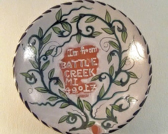 Round ceramic decorative trays - whimsical hand painted - souvenirs from Battle Creek Michigan - majolica pottery