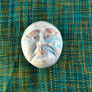 The man in the moon, wall art sculpture. In celebration of the blue moons that happened in the past year.