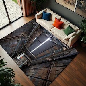 May include: A rectangular area rug featuring a high-resolution 3D optical illusion print of an industrial elevator shaft. The design depicts a deep, dark vertical shaft with metal tracks, brick walls, and a bright light source at the top.