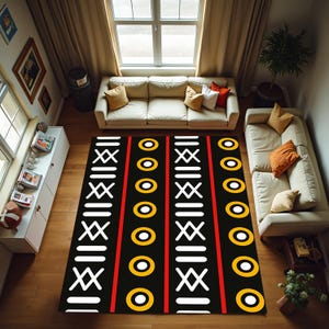 May include: A rectangular area rug featuring a black background with repeating vertical patterns. The design includes rows of white geometric symbols, horizontal bars, and vibrant yellow circles, all separated by thin, bold red vertical stripes.