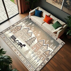 May include: A rectangular rug with a winter village design, including houses, trees, and a horse-drawn sleigh in beige, brown, and grey tones. The rug has a patterned border and is set in a living room.