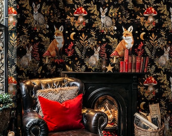 May include: A black and gold wallpaper with a repeating pattern of foxes, rabbits, mushrooms, and leaves. The wallpaper is in a room with a black leather armchair, a fireplace, and a wicker basket.