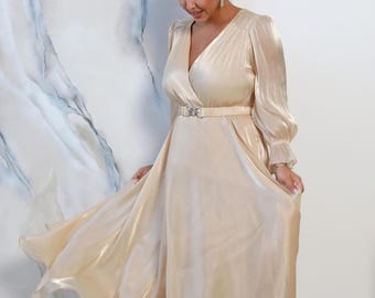 Plus size midi flying dress. For wedding guests, formal evening gown. Flowy pearly chiffon, wrap V-neck, long sleeves, belted waist.