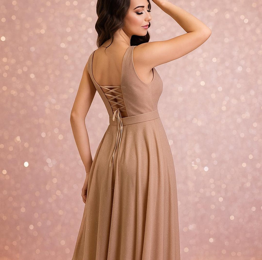 Gold maxi glitter chiffon corset evening gown with slit and lace up back. Elegant holiday and New Year dress