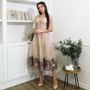 Floral guipure cocktail dress. Midi tulle gown with lace and embroidery