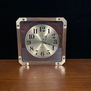 faux wood and brass Dynasty wall clock from the early 80s boho decor retro seventies look