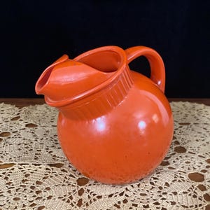 anchor hocking orange tilted ball pitcher juice pitcher rainbow line ball pitcher tangerine orange
