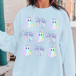 Iridescent Coquette Ghost Halloween PNG, Coquette Holographic Ghost Bow, Cute Ghost Graphic Tee, Pink Coquette Halloween, Pink Spooky Vibes