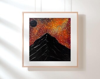 May include: A framed square painting featuring a textured black mountain silhouette against a vibrant orange and red sky filled with small white dots representing stars and a single solid black circular moon in the upper left corner.