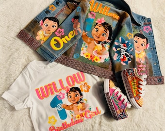 May include: A denim jacket, t-shirt, and pair of sneakers with a Moana theme. The jacket has a pink and yellow flower design, the words "Willow" and "Aloha", and a Moana character. The t-shirt has a pink and yellow flower design, the words "Willow" and "Birthday Girl", and a Moana character. The sneakers have a pink and yellow flower design, the words "Willow" and "Little Willow", and a Moana character.