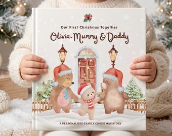 May include: A hardcover book titled Our First Christmas Together Olivia, Mummy & Daddy, A Personalised Family Christmas Story. The cover features a watercolor illustration of three bears in Santa hats standing before a brown door with lanterns.