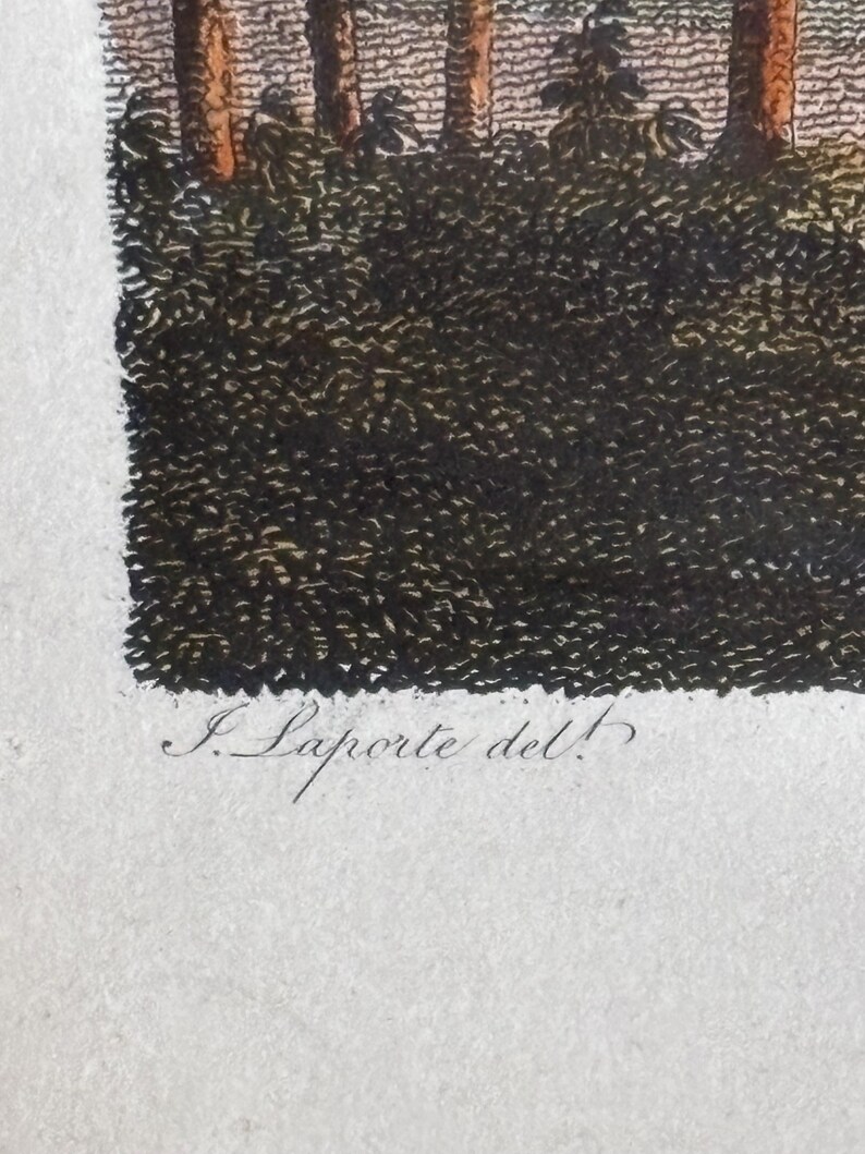May include: An antique print featuring a detailed landscape scene. The artwork depicts a forest with trees and dense foliage, rendered in a combination of colors. The artist's signature, "J. Laporte del!", is visible at the bottom.