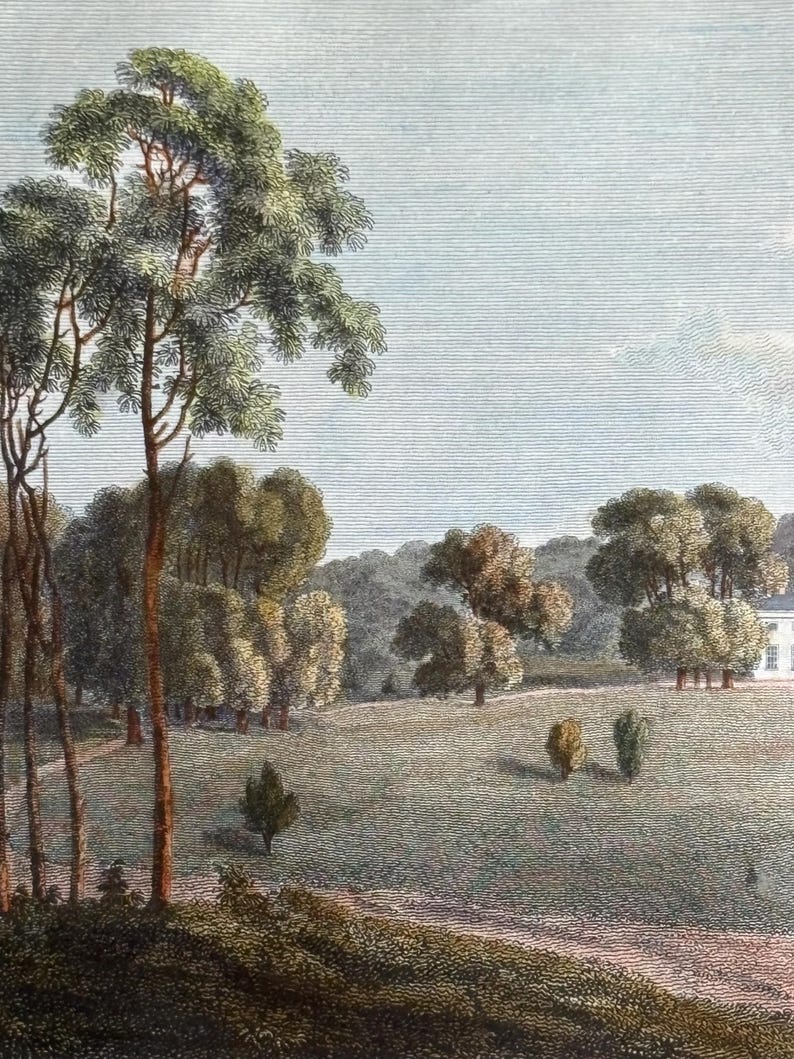 May include: An antique landscape print depicts a serene countryside scene. Tall trees with green foliage frame a grassy field dotted with smaller trees. A white building is visible in the distance, under a pale blue sky.