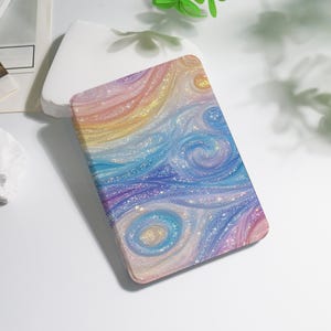 May include: A rectangular case with a colorful, swirling design. The case features a blend of pastel colors including pink, yellow, blue, and purple, with glitter accents. The design resembles a watercolor painting or a starry sky.