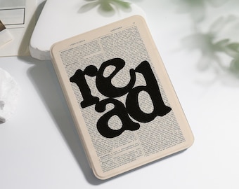 May include: A rectangular light-coloured plaque featuring a vintage dictionary page background with the word read printed in large, bold, black lowercase letters across the centre. The text on the page includes the entry for Aberdeen.