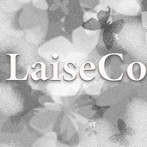 May include: A black and white image with the text "LaiseCo" in a white, stylized font. The text is superimposed on a blurry background of white flowers.