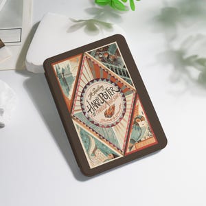 May include: A brown tablet case with a vibrant design from "Harry Potter and the Philosopher's Stone." The artwork showcases scenes from the book, including Hogwarts and an owl. The title "Harry Potter and the Philosopher's Stone" is clearly visible on the case.