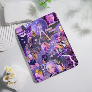 May include: A purple and black tablet case featuring a collage of illustrations, including a woman in a futuristic outfit, musical notes, and disco balls. The case has a glittery background and the text "Rum".