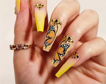 Unghie finte lunghe a forma di farfalla gialla sfumata a bara