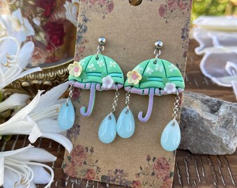 Boucles d'oreilles parapluie vertes avec gouttes de pluie en verre