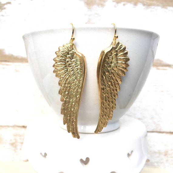 Wing earrings deals