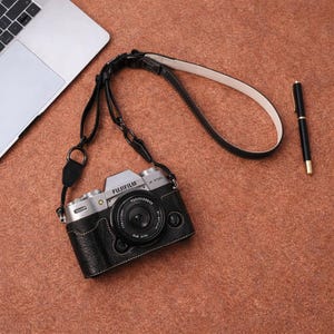 May include: A rustic wooden sign with the text "Welcome to our home" in a handwritten style. The sign features a distressed finish and a simple, inviting design, perfect for a front porch or entryway.